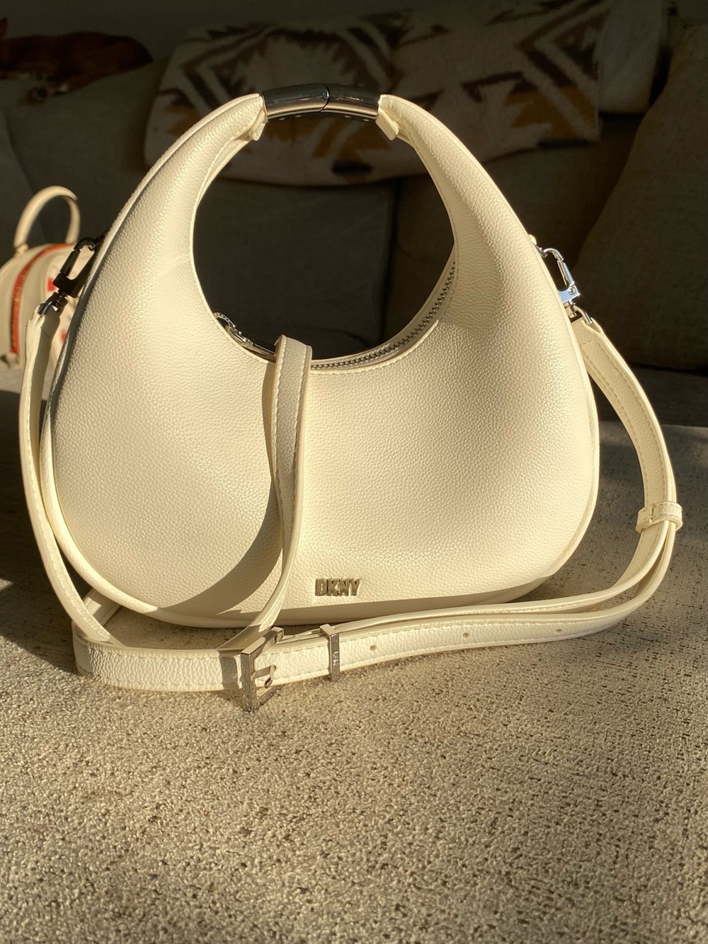 DKNY cream crescent purse